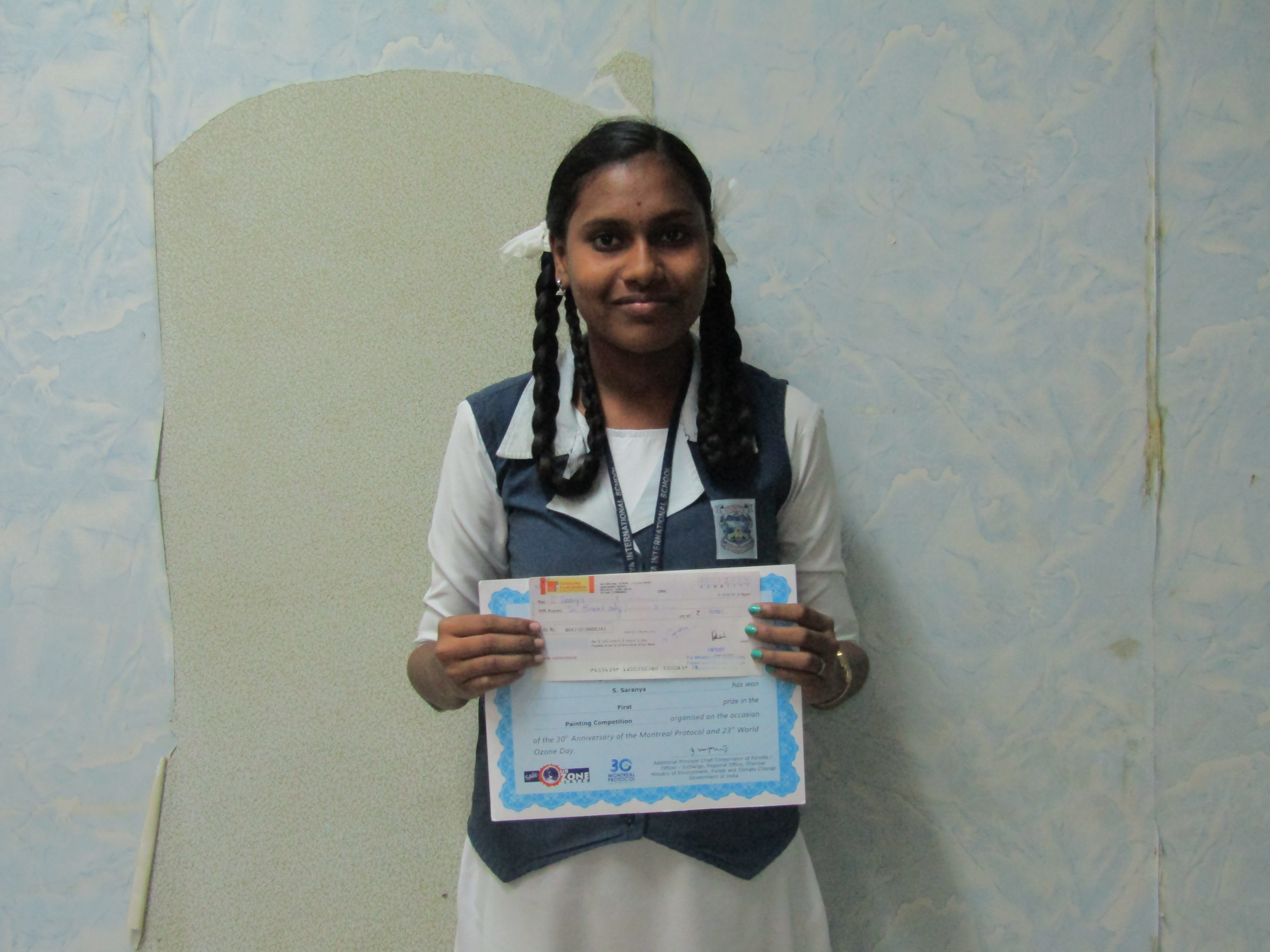 Girl standing with certificate